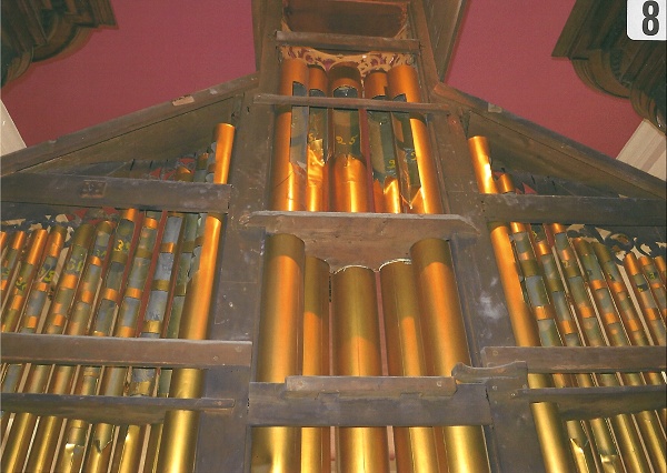 Inside upper front pipes and casework frame.